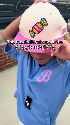 This boy and all his baseball drip. Walking around the baseball field like he owns it.  I just can’t even.  This doubles and bubbles baseball hat and the cotton candy baseball hoodie are so cute together! Love the baseball field #baseballcap #baseballgear #drippy #kidsclothes #boystyle 