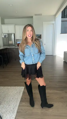 This Chicovar lace mini slip skirt is one of the most versatile pieces in my closet. I can pair it with a chunky sweater and boots for fall, throw it on with a tee for a country concert, or layer it with tights and jackets when the weather gets cooler. The lace detail gives it a high-end look while still being super affordable!! #fallskirtstyle #countryconcertoutfit #versatileskirt #laceoutfitideas #falllayeringlooks 