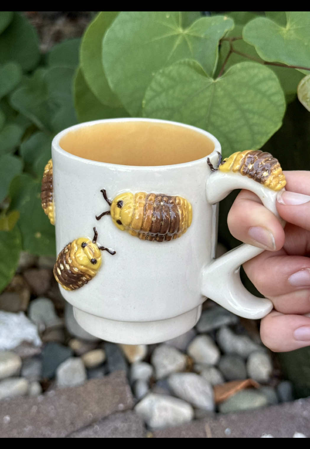 several pieces like this rubber ducky isopod mug found their home this past weekend & i couldn't be more grateful :) im gonna need a week long nap to recover before making some more bug mugs tho!!  #entomologyart #independentartist #ceramicart #ceramicmug #bugart #natureartist #handmadeceramics #bugmug #isopodsofinstagram #rubberduckyisopods