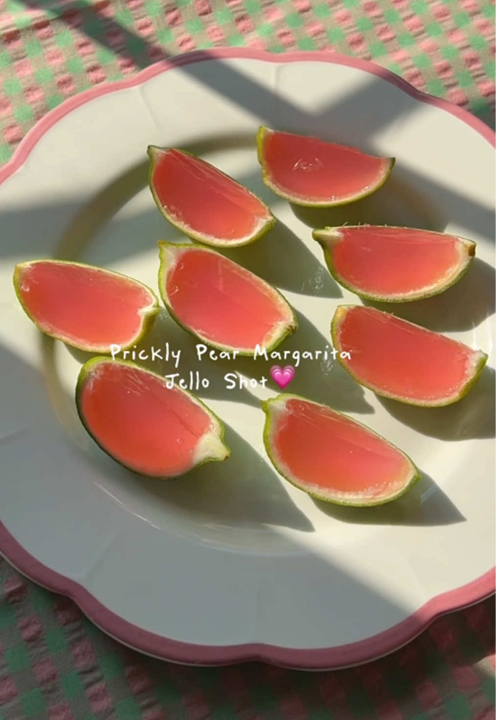 My all-time favorite drink is prickly pear margarita💗 so l made a jello shot version in honor of it😌 I forgot how boozy jello shots can be from my college years😅, but these do taste so good! [Prickly Pear Margarita Jello Shots] ~makes 24 wedges 6 limes 1/4 cup cane sugar 1/2 cup water 1/2 cup lime juice 2 envelopes unflavored gelatin 1/2 cup tequila 1/4 cup cointreau 1/4 cup prickly pear syrup 1. Cut all the limes in halves. Hollow out flesh. Set aside. 2. Sqeeze lime juice. Set aside. 3. In a small sauce pan, combine sugar and water and stir over medium heat. Remove from heat when sugar is completely dissolved. Do not let it boil. 4. Sprinkle gelatin over lime juice and let it sit for ~5 minutes. 5. Stir lime-gelatin mixture into sugar-water in the sauce pan. Warm over medium heat ~ 3 minutes, stirring until gelatin is completely dissolved. Do not let it boil! Remove from heat. 6. Add tequila, cointreau, and prickly pear syrup. Stir to combine. 7. Distribute liquid evenly among lime shells. Refrigerate ~3-4 hours. 8. Cut lime shells in halves before serving! #foodtiktok #foodie #foodietiktok #margarita #jelloshots 