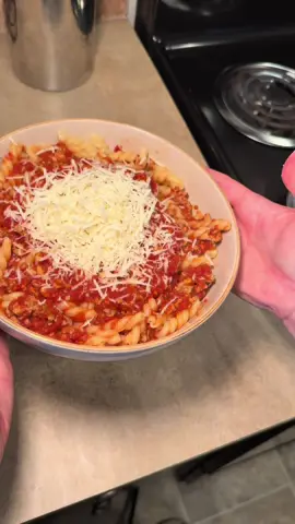Pasta sauce recipe that doesn’t take all day to make: 🤌🏼 •2 tbsp olive oil 🫒 • at least 4 cloves of garlic (I used 13) 🧄 •cook until garlic is lightly sizzling, then add crushed red pepper 🌶️ (measure with your heart) •cook until garlic is slightly browned, about 3 mins •add 1 tsp dried oregano🌿 and cook another 3 mins •add 3 tbsp tomato paste🍅 and cook until softened, about 3 mins •add 2 28oz cans of whole peeled tomatoes with their juices, I blended mine before adding 🥫 •let it come to a simmer then lower to maintain, simmer for at least 30 mins (I did a little over an hour) •season with salt, pepper, and optional butter 🧂🧈 •add cooked and seasoned ground meat 🦃🐄(optional) and let simmer for another 10-15 mins while pasta cooks  •enjoy!! 🍝 #cookingtok #pastasauce #fromscratchcooking 