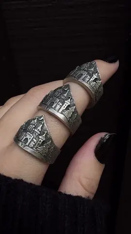 Tonight 8/14 at 7pm est there’s rings will be available to purchase in my shop! 🏰✨ Forged in silver, crowned in stonework, castle rings for those who guard their own kingdom. Two castle rings in size 9 US, one in size 7 US. Please note that orders placed this week will ship next week, as I head to the Maine Scottish Highland Games with @syr_music    #silversmith #fantasyjewelry #handmadejewelry #fantasycore #metalsmith       