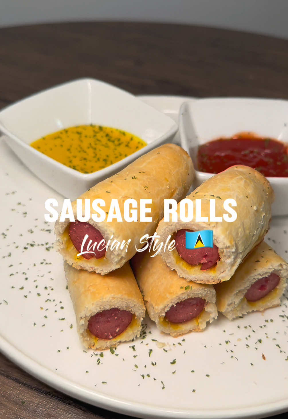Sausage rolls: A finger food favorite enjoyed by Saint Lucians. Quick bites, good eats! Made with simple ingredients: 1. All-purpose flour 2.  Salt 3. Cold, unsalted butter 4. Ice-cold water 5. Sausage of your choice 6. Egg + milk (for glazing) 7. Mustard or condiments of your choice #fyp #yummyfood #saintluciantiktoker🇱🇨 #caribbeantiktokeurs🇭🇹🇬🇾🇹🇹🇸🇷🇯🇲 #carbbeantiktok🇬🇾🇯🇲🇹🇹🇧🇸🇧🇧🇱🇨 