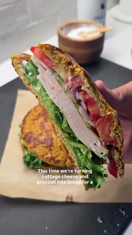 COTTAGE CHEESE & BROCCOLI BREADWICH 🥦 390 Calories, 55g protein! I’ve made lowcarb bread from zucchini, pickles, jalapeño, and just about everything, but wanted to sneak in a little more protein into this one. Verdict? You need to try this. The cottage cheese holds things together, the broccoli adds tons of nutrients, and it works perfectly as a sandwich base. Remember to use a firmer cottage cheese. I used Good Culture. Dont use a watery one, or it won’t work! And make sure you let it COOL. Here is how I made it: 1.Preheat oven to 400°F. Line a baking sheet with parchment paper and spray lightly with avocado oil. 2.Grab a food processor and process 8oz cottage cheese, 6oz broccoli, 1 egg, 1 tsp smoked paprika, 1 tsp onion powder, and 1 tsp garlic powder until smooth. 3.Spread the mixture into two circles on parchment. Bake 20 to 22 minutes until set. Let cool completely before handling. 4.You can use mayo or any condiment you want. I snuck in some more protein. for the sauce, mix 2 tbsp Greek yogurt, 1 tsp mustard, 1/4 tsp onion powder, 1/4 tsp garlic powder, salt, and pepper. 5.Layer the bread with lettuce leaves, organic turkey slices, fresh tomato, thin red onion, and shaved cucumber. The cucumber is important - it adds such a nice crunch. 6.Cut in half, or diagonal, and enjoy! If you try this, let me know on SHREDHAPPENS. . ENJOY!