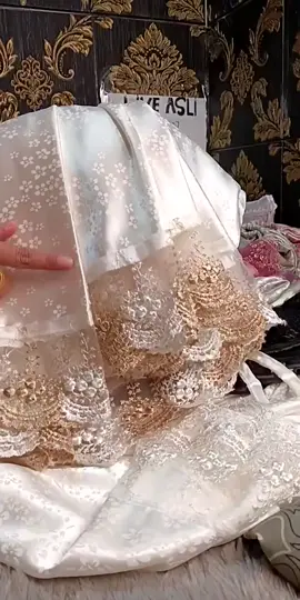 Dzahin Mukena Sutra Aliya, mewah dan lembut! Ada renda tile cantik, cocok untuk hadiah atau dipakai sehari-hari.