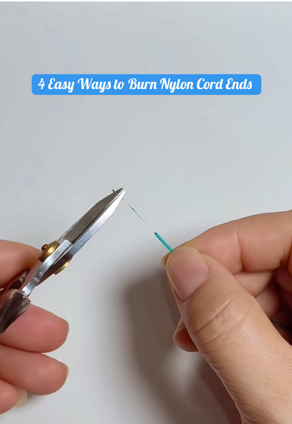 Many of you ask how to add beads to nylon cord, here are 4 simple ways to burn the ends so beads slide on easily. 🔥✨ Don’t worry, it’s not as hot as it looks, just take it slow and be careful. Perfect for macrame, bracelet making, and all your DIY projects! 🩵🧵 #MacrameTutorial #BeadingTips #BraceletMaking #DIYJewelry #CraftTutorial