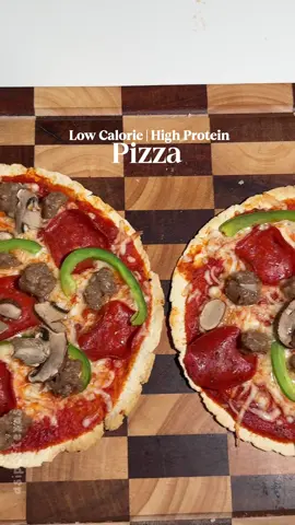 Low Calorie High Protein Pizza Guilt-free pizza night is here! This low-calorie, high-protein pizza is loaded with flavor, packed with protein, and perfect for hitting your health goals without missing out. This macro-friendly recipe will keep you satisfied. Ingredients: Reduced Fat Sausage Turkey Pepperoni Nonfat Mozzarella Cheese La Tortilla Factory Carb Cutting Tortilla Pizza Sauce Bell Peppers Mushrooms  Bake in the oven at 400 for 7-9 minutes. #pizza #proteinrecipes #highprotein #healthyrecipes #mealprep
