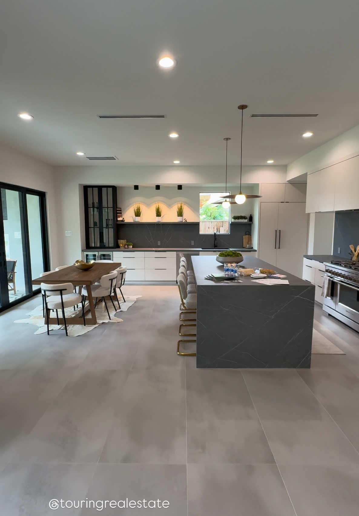 You might want to sit down for this one… 🪑💭 because this Houston home will steal your heart ❤️ and blow your mind 🤯—at the same time. 📍 1225 Althea Dr | $1.89M This modern masterpiece is more than just a house—it’s a full-blown luxury experience you didn’t know you needed. From the moment you walk in, you’re met with jaw-dropping design ✨, floods of natural light 🌤️, and a layout so open it practically breathes. ✨ 5 Beds • 5 Baths ✨ 4,660 sq ft of elegance + style The main living area? Wide open + drenched in light—perfect for everything from Netflix nights 🍿🛋️ to hosting that dreamy dinner party 🍷🍴. The chef’s kitchen 👩‍🍳 features: • Pot filler 🙌 • Soft-close drawers ✨ • Spacious pantry 🥖 • Second sink for multitasking magic (yes, please!) Downstairs game room 🎲 | Upstairs family room 🎬 | Walk-in primary closet 👗👠 big enough to inspire a shopping trip. But the real jaw-dropper? 😍 An oversized covered patio 🌿 + rare 9,300+ sq ft lot 🌳 giving you that dreamy indoor-outdoor lifestyle Houston is known for. And let’s not forget the designer finishes 🪞, soaring ceilings 🏛️, and custom touches throughout. Built by award-winning Echo Custom Homes 🏆—every detail was crafted with intention. 💡 Décor lovers: I’ve found some of my favorite home decor pieces (the same or very similar to the ones you see here) and linked them for you on my LTK 🛋️✨. Think statement lighting 💡, cozy seating 🪑, chic accents 🕯️, and everything you need to bring this look home. https://liketk.it/5lwQ2 📌 Important note: I’m not affiliated with this listing—I just couldn’t resist sharing this incredible home + the décor inspo it sparked. If this home just made your Pinterest board jealous 📍… tap over to my LTK to shop the look, share this with your dream-home crew 🏡💕, and follow along for more décor finds + home tours that make your heart do backflips. No apologies. Just beautiful homes + design inspiration. 🖤 #realestatetiktok #homesweethome #luxuryhomes #hometour #homedecor