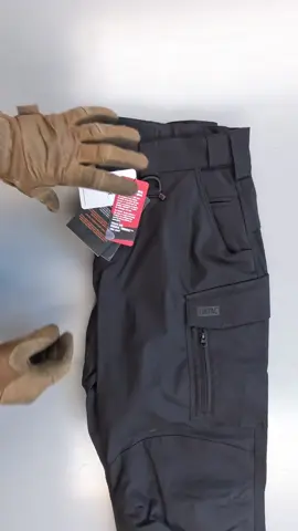 Tactical Pants UATAC Lite Flexible Black Tactical Pants UATAC Lite Flexible Black are designed specifically for the military, have a versatile cut and are suitable for a variety of conditions of use - training, shooting range, work or walking. The fabric consists of Fabric 58% polyester and 39% cotton, 3% elastan, which makes it pleasant to the touch and resistant to tearing and damage. Ripstop weaving will prevent the pants from tearing even under heavy loads. Large cargo pockets with Velcro.Equipped with an additional compartment for storing oversized items and a carabiner. On the side of the cargo pocket there is a zipper for convenient access while sitting. Special convenient phone pocket on the right side. Two front pockets for a knife or flashlight. Large compartment in the knee area with the possibility of installing a knee pad inside (sold separately). The belt is made elastic, with the possibility of stretching. Pants are designed to be worn with a belt up to 6 cm.Convenient Velcro fasteners on the cuffs of the pants. Fabric 58% polyester and 39% cotton, 3% elastan. Ripstop weaving Elastic 