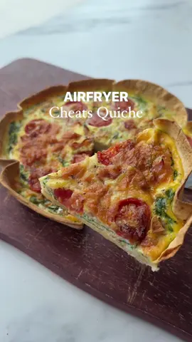 Airfryer Cheats Ham, Cheese & Tomato Quiche 🥚   This is such a quick and easy lunch, high in protein and super filling. Over 44g of protein and 522 calories.     Ingredients:  - 1 tortilla wrap   - 3 large eggs, beaten  - 2 tbsp fat-free cottage cheese  - Handful of cherry tomatoes  - 2 slices of ham, diced  - Handful of chopped spinach  - 30g reduced-fat mozzarella  - Salt & pepper    Method:  1. Add your tortilla wrap to a cheesecake tin and flatten down. Add your chopped spinach, beaten egg and cottage cheese and give that a good mix. Then add the rest of your toppings.  2. Bake in the oven for 18 minutes at 200 or air fry for 15 minutes at 200 until the egg is fully cooked.  3. Slice and enjoy 😊   PS my brand new book Healthy Fakeaways is now available for preorder. Simply comment FAKEAWAY and I will send you a link to preorder your copy half price 😊   #boredoflunch #lunch #lunchrecipes #EasyRecipes #quiche    