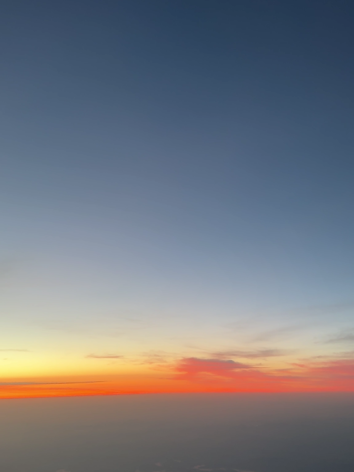 Sunrise over Incheon Sky at Dawn A Serene View of the Incheon Sky at Dawn, with the Horizon and the First Rays of the Rising Sun Painting the Clouds in Warm, Golden Light. #incheon #sunrise #dawnsky #horizonview #travelphotography