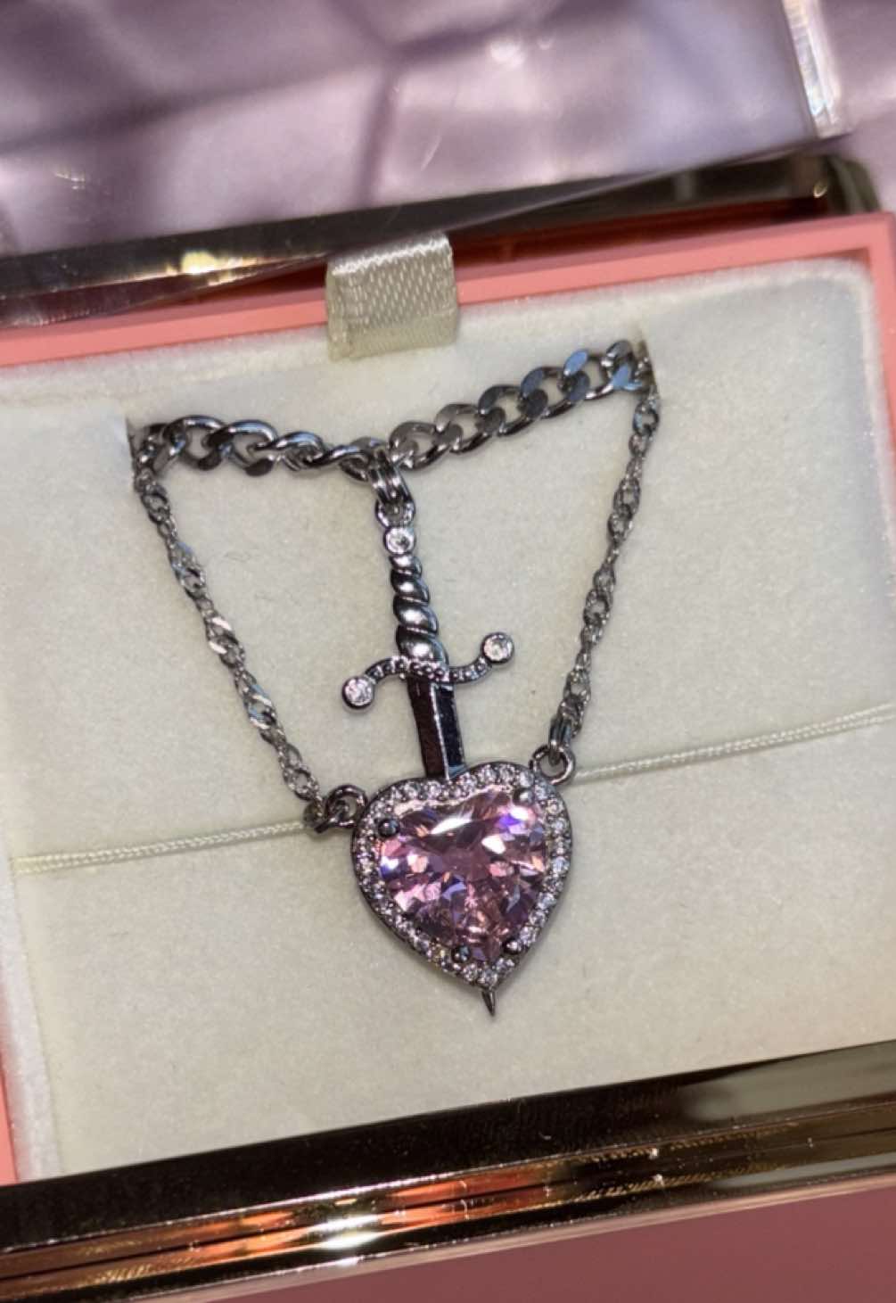 Pink Heart and Sword Couple Necklace is to die for 😍🩷🗡️✨#couplenecklace #couplejewelry #heartswordnecklace #snowwhiteandthehuntsman #fy 