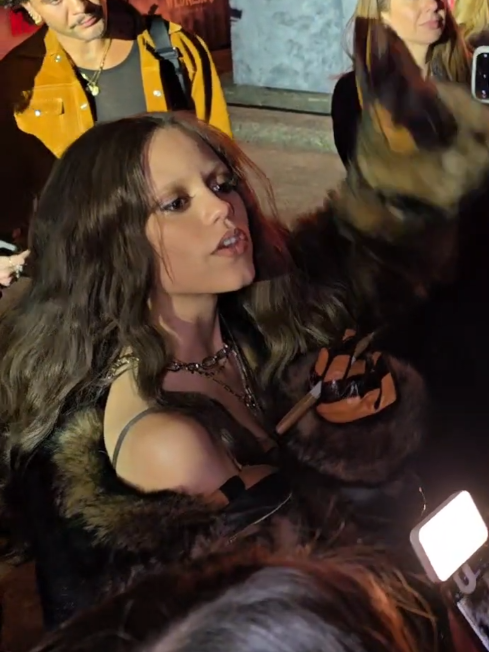 the way she walked down like 20 metres of the barricade signing things before realising 🤣  #wednesdayisland #wednesday2 #wednesday #jennaortega  @Netty @Wednesday Netflix 