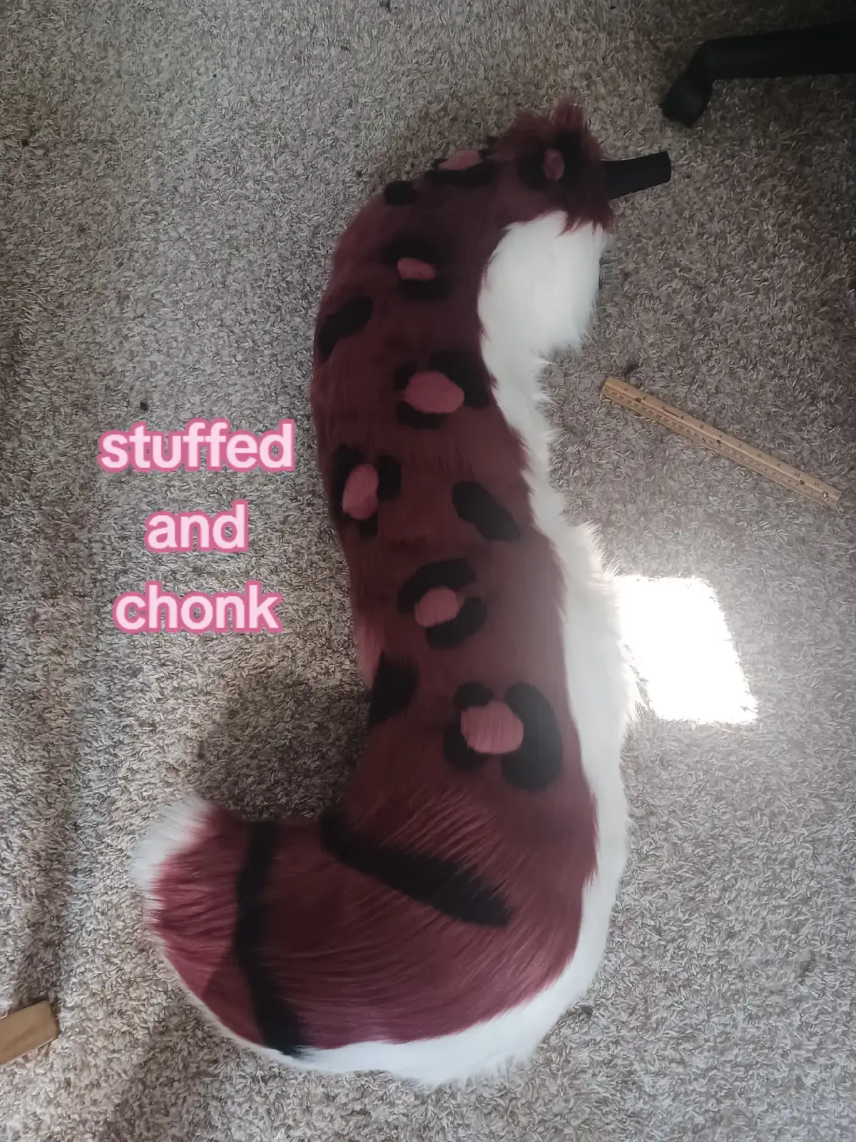Thank you to my husband for modeling for me!!❤️ I'm nearly done, just some fur detailing. this was way THICCER than I thought it was gonna be, very chonk!! first time doing heavy patterned design and a hidden belt loop, turning it better than expected but next are meant to be matching hand paws... #commissionsopen #ichigobunny #furry #furryartist #fursuitmaker 