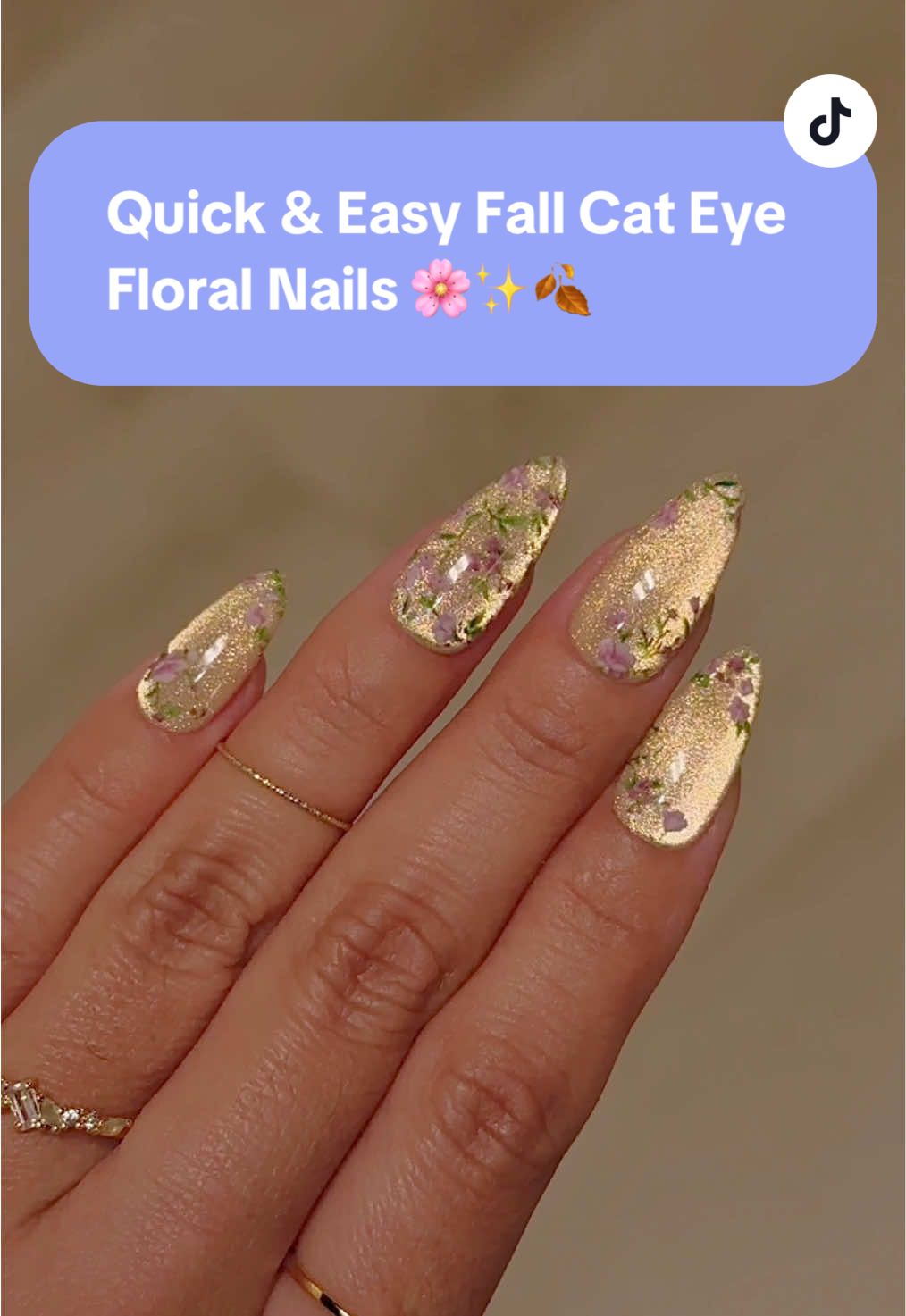 Quick & Easy Fall Cat Eye Floral Nails 🌸✨🍂 The cutest fall garden vibes on your nails 💛  💅 Everything used for this look is from the brand Daily Charme & is listed below. All goodies are available now in our TikTok shop or via the 🔗 in bi0 💖 Save & share for nail inspo!  Using @daily_charme:  ✨ E11 Casablanca 💐 Petal Kiss Nail Art Foil Box 🧲 Strong Cat Eye Magnet Cylinder 💅 Foil Transfer Gel 🌸 Garden Party Nail Foil Box 💎 Diamond Shine Top Coat #floralnails #fallnails #fallgardennails #autumnnails #cateyenails         
