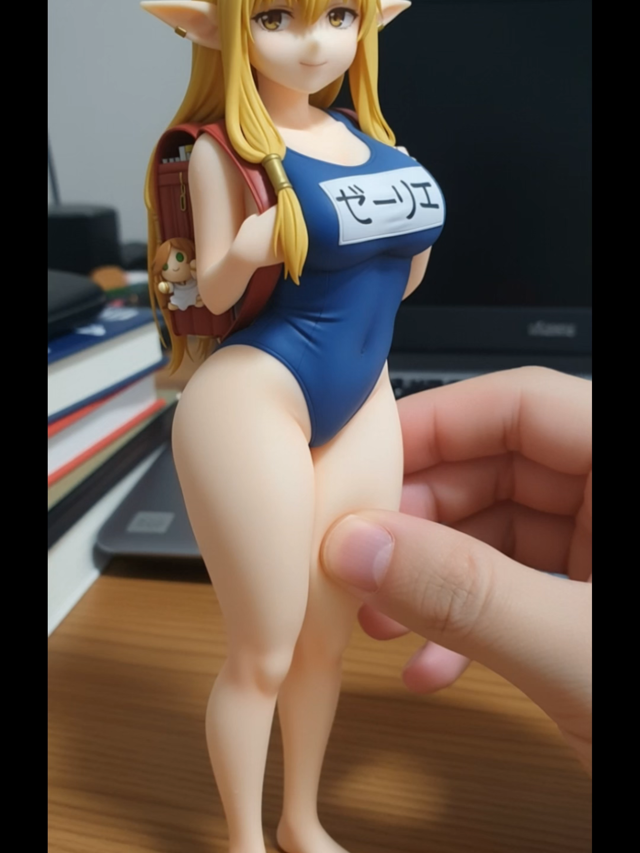 Anime Elf Girl Figure with a Backpack and School Swimsuit #AnimeFigure #PVCFigure #ElfGirl #ElfEars #SchoolSwimsuit #Sukumizu #Backpack #BustyFigure #BlondeHair #CuteGirl #Collectible #Statue #JapaneseFigure #MoeFigure #FantasyFigure #SchoolGirl