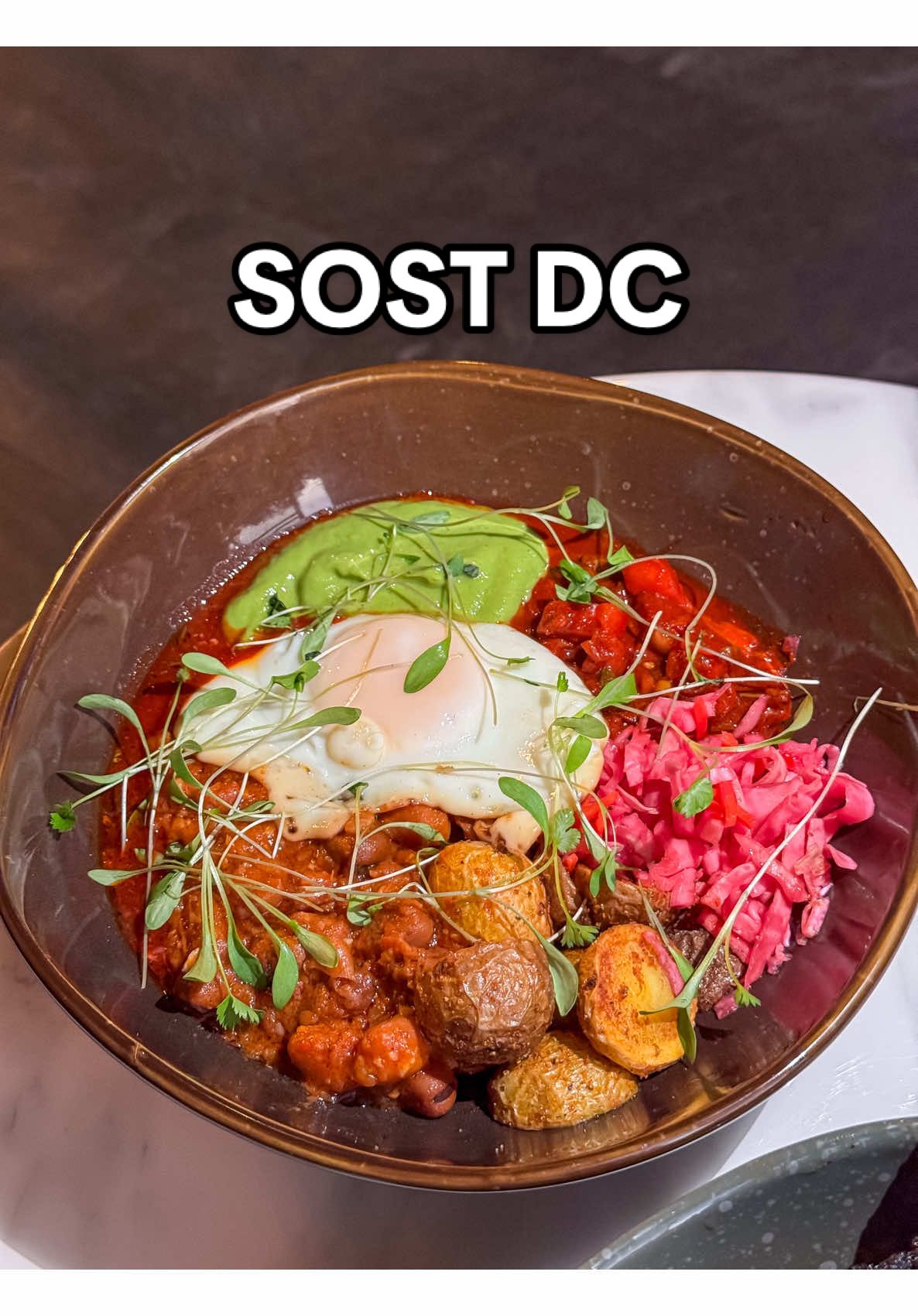 SOST DC: your next third space! Sost DC is where the Black and African diaspora thrive through music, food, and community. It’s a hybrid-cafe, vinyl room, and resto-lounge. Walking in I immediately felt so welcomed and the space was stunning. They’re currently participating in restaurant week for brunch, lunch, and dinner, so I was able to try a dishes from those menus! I really loved everything I tried but two of my favorites were the akarra fritters and spiced lamb meatballs. There are also two new bowls: Soul “Fuul” and the Injera that are worth trying too!  #sostdc #blackowned #washingtondc #dctiktok #dmvtiktok ramwdc 