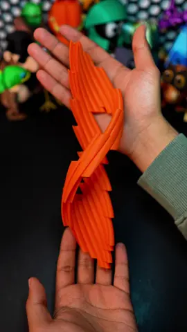 3D-Printed Twisty Fidget Vase. 📁File: Makerworld 🖨️Printer: @bambulab_official A1 AMS Filament: @BAMBULAB Official PLA Orange #asmr #3dprinting #twisty #fidget #vase 
