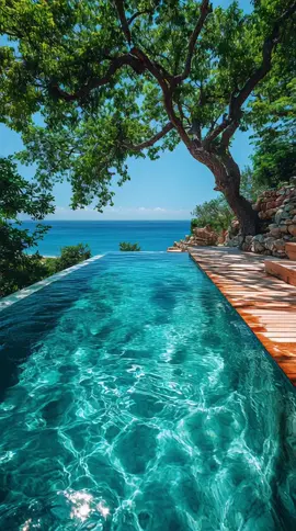 POV: You found paradise 🌊✨ Who else could stay here forever? 🏝️☀️ #VacationGoals  #InfinityPool  #ParadiseVibes  #OceanView  #TravelTok 