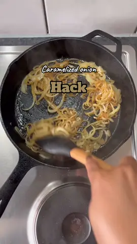 Caramelized Onion Hack If you’ve ever tried making caramelized onions, you know the struggle , they’re delicious but they take forever (like 40 minutes). The truth is, all you technically need are onions + oil, because onions naturally have sugar that breaks down slowly over time, giving you that jammy sweetness. But here’s my hack when I don’t want to wait: I add a touch of sugar + a splash of balsamic vinegar. ➡️The sugar speeds up browning, cutting down the cooking time by 10-20 minutes. ➡️The balsamic adds depth + tang, giving you that “cooked-all-day” flavor in way less time. ➡️And a pinch of salt balances it all out. The result? Jammy, golden, sweet onions in half the time , perfect for pastas, sandwiches, burgers, or even a salad topper. Recipe (Quick Hack Version) 	•	2 large onions, thinly sliced 	•	2 Tbsp olive oil 	•	1-2 tsp sugar 	•	1 Tbsp balsamic vinegar 	•	Pinch of salt Method: 1️⃣Heat olive oil in a wide pan over medium heat. 2️⃣Add onions + pinch of salt. Cook, stirring occasionally, until they begin to soften (about 5 min). 3️⃣Sprinkle in sugar. Stir and let it help the onions caramelize faster. 4️⃣Once onions are golden, add balsamic vinegar to deglaze and deepen the flavor. 5️⃣Cook a few more minutes until sticky, glossy, and jammy. 💡 Tip: For the classic slow version, just skip the sugar + vinegar , but be ready to stir for 40 minutes 😅 #CaramelizedOnions #KitchenHacks #FoodieTips #HealthyThandi #PlantBasedEating  