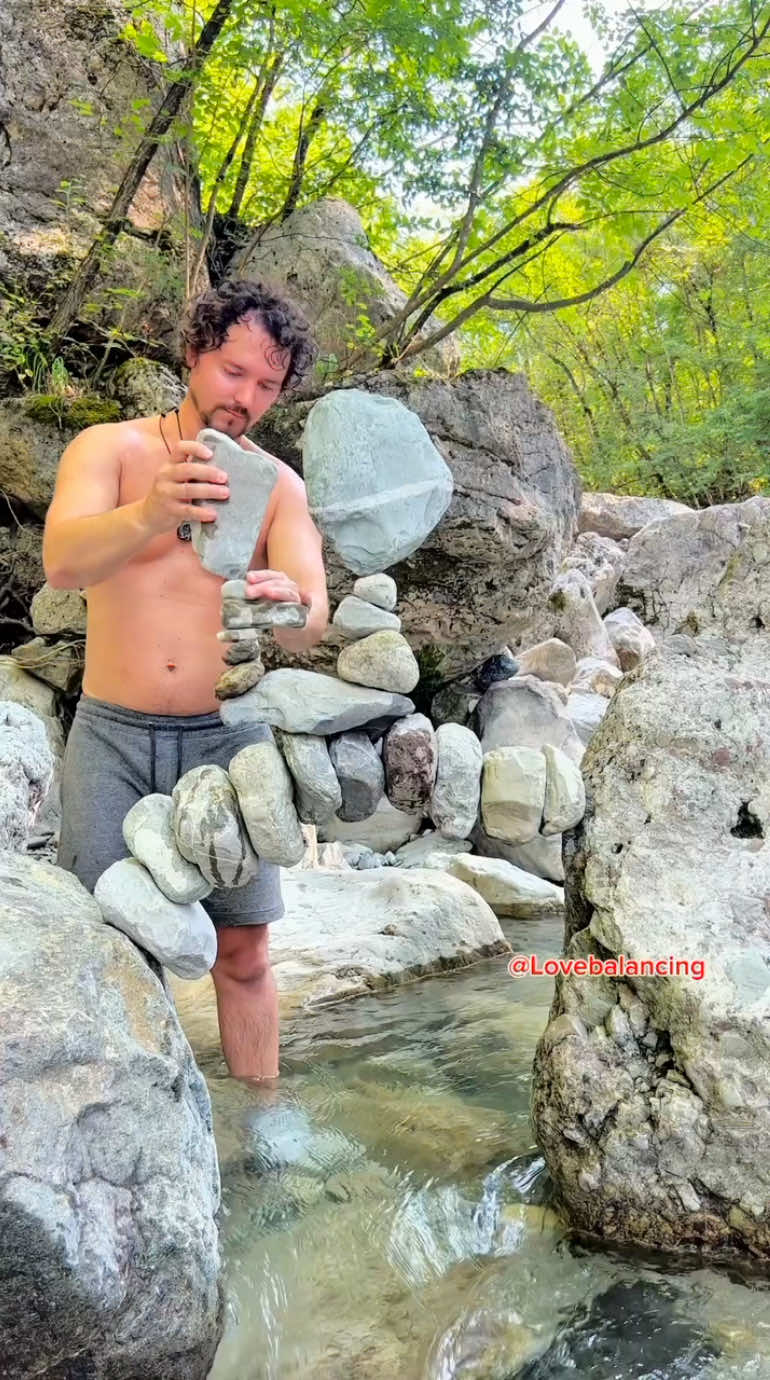Carlo Molinari, a Polish-born artist now based in Italy, is a true expert in the art of stone balancing. His intricate creations, often crafted along riverbanks and incorporating tree branches or nearby elements, highlight a remarkable balance between nature and gravity. Pushing the boundaries of his craft, he integrates leaves, fire, and water, transforming his balanced stones into captivating, almost meditative installations. Artist: @Carlo Molinari  #art #balance #artist