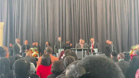 Rev L S Msibi singing in the Memorial service of Pastor Wandile Dlamini at FEA Zakhele 