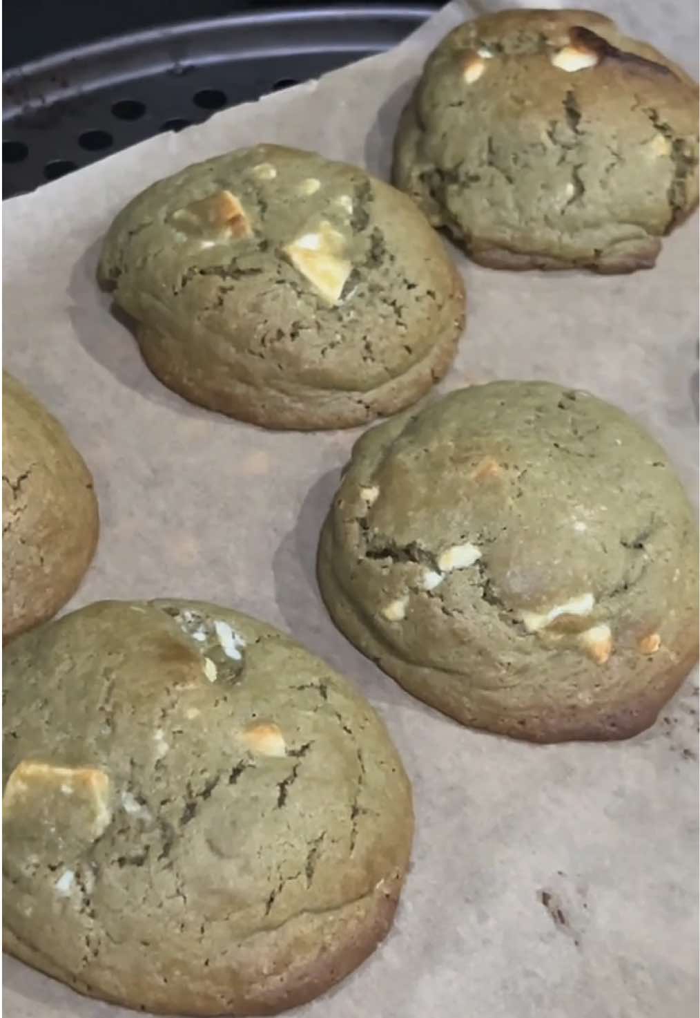 Matcha white chocolate cookies 🍵🍪 ingredients:     - 110g cold but soft unsalted butter     - 75g brown sugar     - 50g white sugar     - 1 egg + 1 yolk (room temperature)     - 158g plain flour     - 6g cornflour      - 1/2 tsp baking soda     - 10-15g culinary grade matcha powder      - 100-150g white chocolate  	Method     1. In a large bowl, whip the butter in two parts, making sure to gather it all in the middle with a spatula     2. Fold in the sugars     3. Add egg + yolk, beat until just combined.     4. In a separate bowl mix the dry ingredients (flour, cornstarch, matcha and baking soda).     5. Fold the dry mix into wet mixture until just combined      6. Fold in the chocolate chunks.     7. Chill the dough for minimum 60 min, max 24hours.     8. Divide into 6 big balls (110–130 g each).     9. Bake at 200°C for 10 min, until edges set but centres still soft.     10. Cool for 10 mins before serving and enjoy! #creatorsearchinsights #matcha #matchacookies #baking #Recipe 