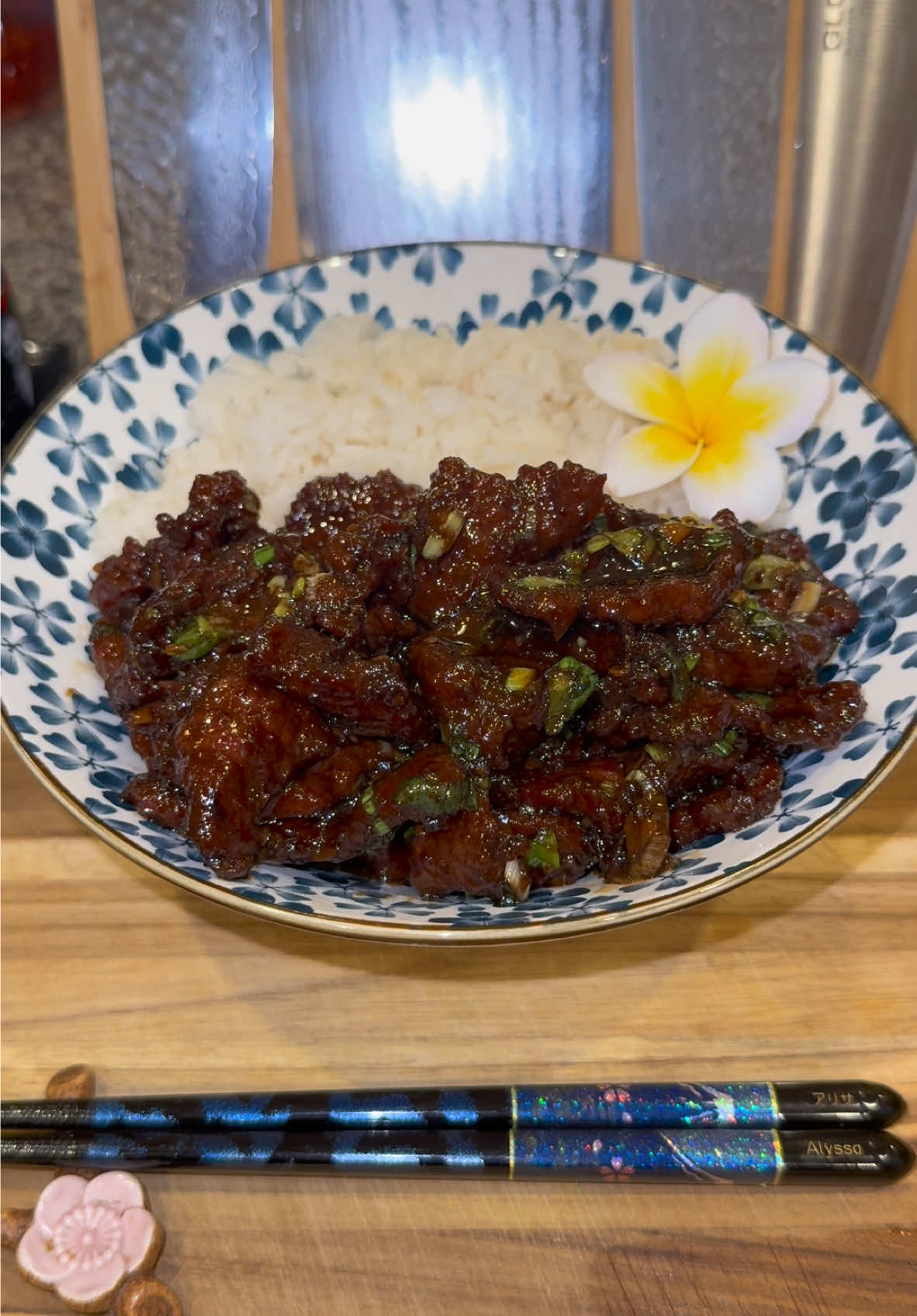 Mongolian Beef🥩 #Recipe #mongolianbeef #beef #steak #chinesefood #foodtiktok #food  Start out by getting 2 pounds of top sirloin and slice it into thin pieces.  Then add it to a bowl with: -1.5 tablespoons of soy sauce  -2 tablespoons of Shaoxing wine (or dry sherry if you can’t find it) -1 teaspoon of baking soda  -1 tablespoon of neutral oil -pepper to taste  Mix this all together and let it marinate for about 30 minutes.   Right before cooking, add in 5 tablespoons of cornstarch and evenly coat the meat with it.  Then fry it all up in batches in neutral oil heated to 350 degrees, and set the meat aside.  For the sauce, in a bowl add: -1 cup of light brown sugar  -1 cup of water  -1/2 cup of regular soy sauce  -1.5 tablespoons of dark soy sauce  -2 tablespoons of Shaoxing wine Then add 2 tablespoons of neutral oil to a pan on medium heat along with: -2 tablespoons of minced ginger -2 tablespoons of minced garlic  -sliced fresh chilis and red pepper flakes (if you want it spicy) -your sauce mixture  -some MSG (if you want it to taste extra delicious)  Let the sauce reduce by half, then add in your beef and let it simmer for a few minutes or until the sauce thickens.  Right before serving, fold in one heaping cup of sliced green onions.  Enjoy💜