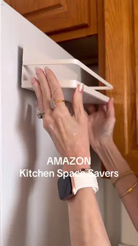 https://urlgeni.us/amzn/fridgemagneticshelves Organize your kitchen with these heavy duty magnetic shelves! Stainless steel and acrylic knife set, Glass and bamboo jars, and stainless steal automatic salt and pepper grinders… Save counter space, get organized  and create accessible storage so your kitchen functions better! #amazonhome #kitchenessentials #smallkitchen