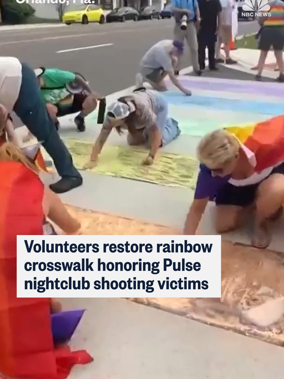 Volunteers used colorful chalk to restore a rainbow crosswalk in #Orlando, #Florida, which honored the victims of the Pulse nightclub shooting.