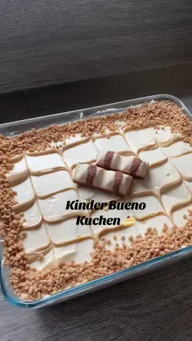 In Baked Bueno Kuchen 🍰  Zutaten:         •400 g Sahne 	•	500 g Mascarpone 	•	1 Packung Löffelbiskuit 	•	3 EL Puderzucker 	•	2x Vanillin Zucker 	•	1x Sahnefest 	•	1x Milch (zum eintucken     von Löffelbiskuits 	•	1x Bueno Creme 	•	1x Bueno Riegel 	•	1x Haselnuss (Haselnuss Krokant) Ich habe 3 EL Haselnuss Creme mit in die Creme gepackt. Ich habe 5 Riegel klein gemacht und dazwischen gelegt und die restliche Haselnuss Creme habe ich im Wasserbad schmelzen lassen und in Muster geformt 🫶🏼 Für mindestens 5 Stunden im Kühlschrank lassen  #buenokuchen #nobakedessert #bueno #backen #baking 