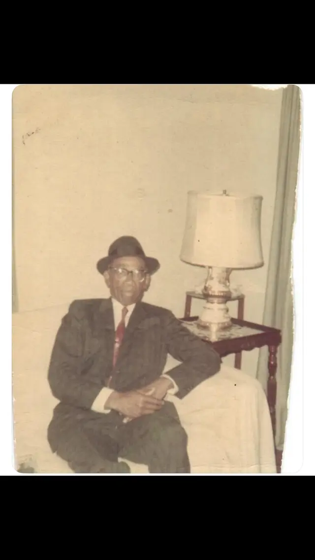 Found this on Reddit.. Found inside an old book: An elderly man sitting in a living room, no date or location given. Inscription on back says 