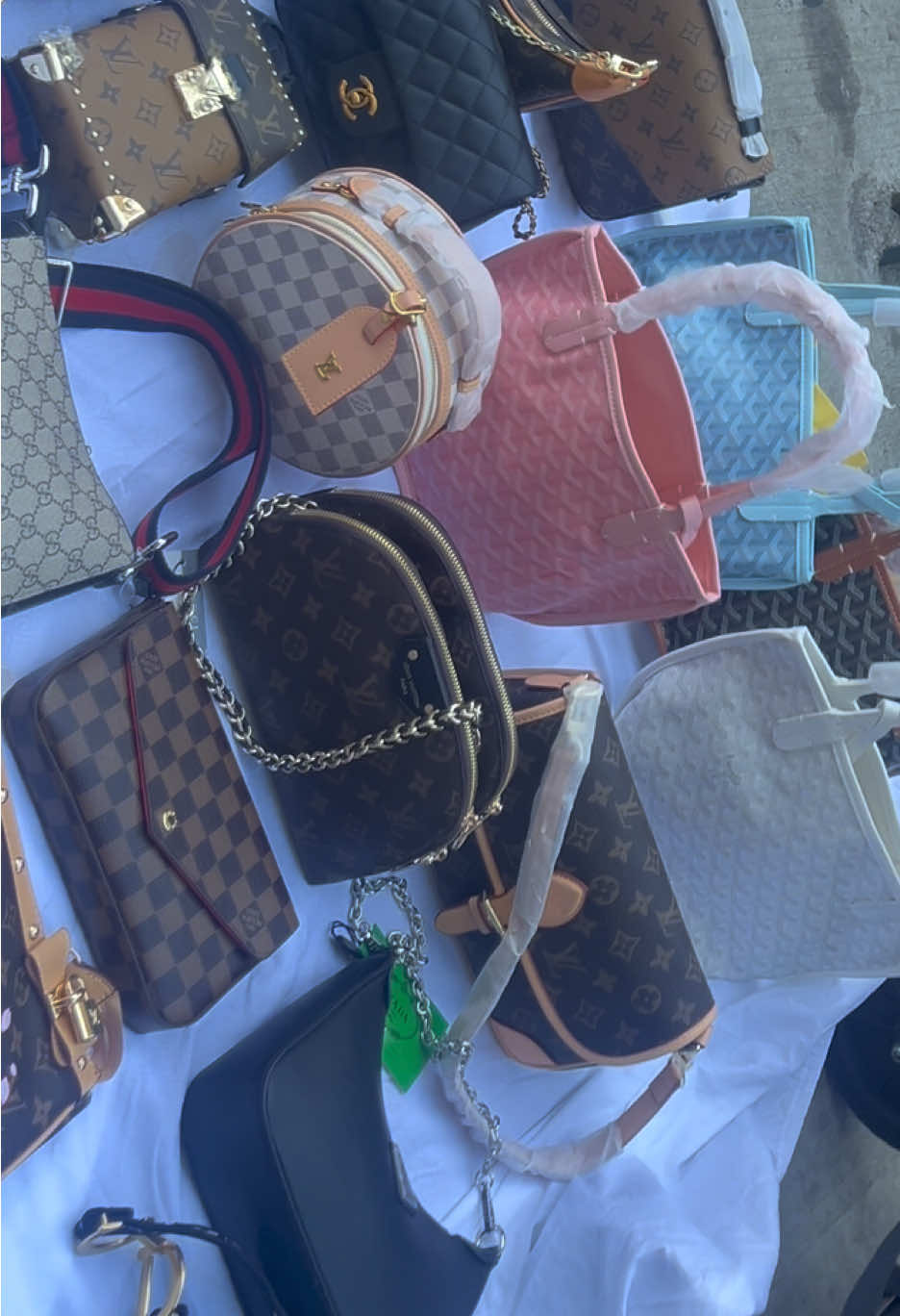Saturdays on canal street #CanalStreet #NewYorkCity #purses #goyard #dior 