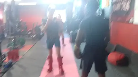 As I was attempting to chop up nice clips from Elliott's video, I quickly realised that the whole two and a half minute video was a highlight reel! He will hopefully get his 1st fight soon! Watch the entire video if you get a chance What's going on here is one guy gets to target practice on his opponent using a nice flow, while his opponent tries to catch his punches and takes his kicks, knees, and body shots! The aim isn't technical defence. It's to try to get into a flow state where every punch and kick gets thrown seamlessly! Pretty sure he understood the mission  🔹 Benefits for the Attacking Fighter (Free Flow) 1. Creativity & Fluidity – The attacker gets to string combinations together without worrying about counters interrupting them. This builds natural rhythm and confidence in throwing. 2. Shot Placement & Accuracy – They can focus on where shots land (on arms, body, legs, guard gaps) without full resistance. 3. Flow State Training – Instead of “thinking” about combinations, the attacker learns to let techniques flow naturally, like shadowboxing but on a live target. --- 🔹 Benefits for the Receiving Fighter 1. Conditioning – The receiver’s body, guard, and legs toughen up by absorbing low kicks, body shots, and glove impacts. 2. Defense & Composure – They learn to stay relaxed under pressure, defend properly, and not panic when being hit. 3. Reading Opponents – By watching combinations unfold, they develop a sharper eye for common setups, feints, and striking patterns. --- 🔹 Benefits for Both Fighters Trust & Control – The drill builds partner awareness. The attacker learns control, while the receiver learns confidence in taking shots without injury. Technical Focus – Because intensity is controlled, both fighters can focus on technique rather than “winning.” Fight Simulation Without Risk – It gives a real sense of fighting rhythm, but without the heavy damage of hard sparring. --- 👉 In essence, this version of free-flow sparring is like a live padwork session with a thinking, moving partner. The attacker sharpens offensive creativity, while the defender strengthens resilience and awareness. Together, it’s one of the safest yet most effective ways to replicate the feel of a fight. #muaythai #sparring #kickboxing #dedication #discipline 