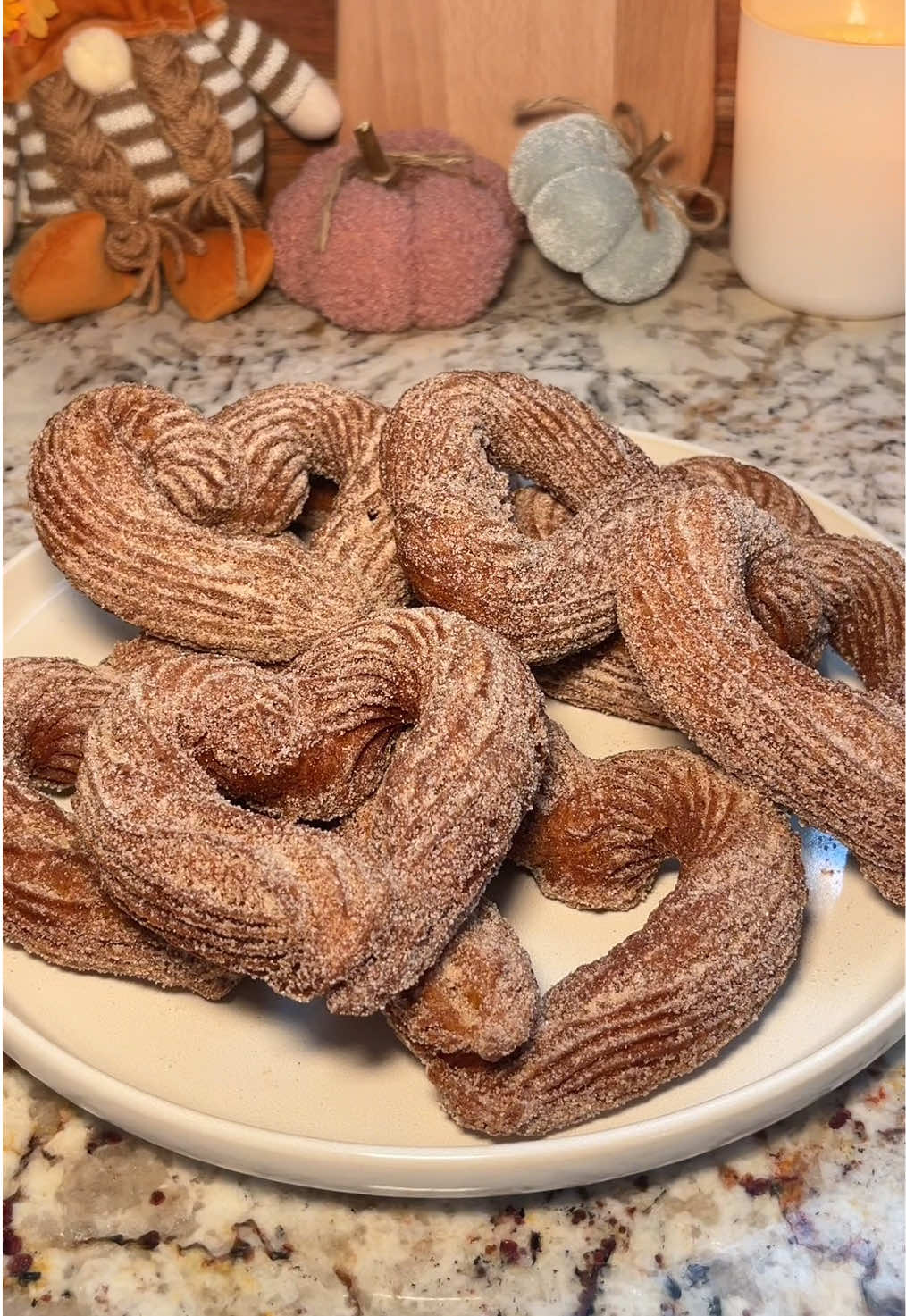 Pumpkin spice churros 🧡 i had to repost this same video a couple times cause of malfunction lmaooo anyways, full recipe/instructions on my website. Link in bio 🫶 For the pumpkin churros: * 1-2 quarts canola oil (or your preferred oil for frying) * 1 teaspoon pumpkin pie spice  * 1/2 teaspoon cinnamon  * 180g flour * 3 eggs * 140g pumpkin purée * 240g water * 57g butter * 30g brown sugar  * 1/2 teaspoon salt * 1/2 tsp vanilla extract  Pumpkin spice sugar for finishing: * 100g sugar * 1 1/2 tsp ground cinnamon * 1 1/2 tsp pumpkin spice * 1/4 cup caramel sauce for dipping #pumpkinseason #pumpkinspice #churros #bakingtiktok #bakingrecipe 