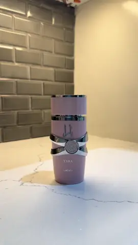 A sleek and elegant bottle of Lattafa Yara Eau de Parfum, designed in a soft pink tone with silver accents. This fragrance is known for its creamy, fruity, and floral blend, making it both modern and feminine. @LATTAFA 🩷 Soft, elegant, and unforgettable ✨ Lattafa Yara is the perfect mix of fruity freshness, floral charm, and creamy sweetness in one bottle. Fragrance Notes: 	1.	Top Notes: Tangerine, Heliotrope, Orchid 	2.	Heart Notes: Tropical Fruits, Gourmand Notes 	3.	Base Notes: Vanilla, Musk, Sandalwood #Lattafa #YaraPerfume #fyp #trendingvideo #viral 