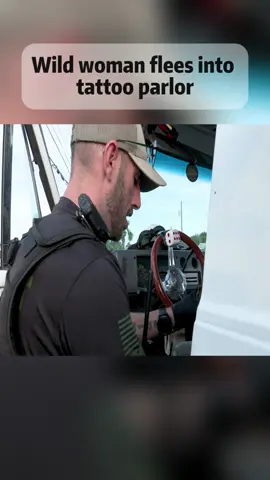 Wild woman flees into tattoo parlor