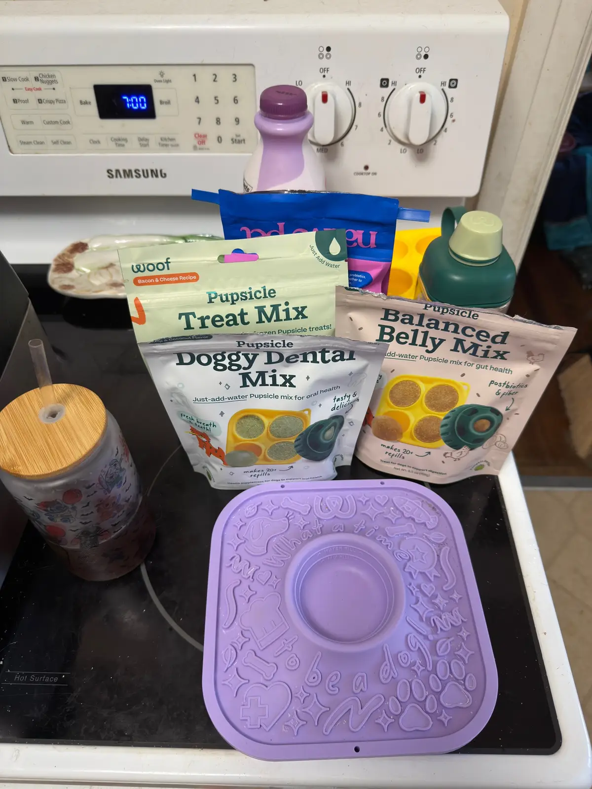 @Woof Pet pupcicles and lick mat prep - dentil mix - treat mix - balanced belly mix I like to take the leftover from the the mixes and I put them on a lick mat with some kefir and freeze it so nothing goes to waste. Then I added the @Native new gut well on top.  What are your fav recipes to use for your pupcicles?  ✨links in bio✨