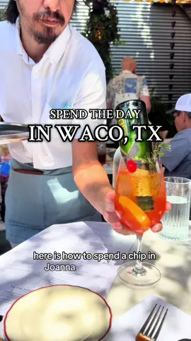 How to spend the day is Waco, TX like HGTV stars, Chip & Joanna ✨ Waco, TX is an hour and a half away from Dallas and honestly has more to do than you may think. They now have a booming historic downtown area that is super walkable with so much to see. It’s on the Up! And part of that is because of the HGTV stars Chip & Joanna who became famous by flipping houses in Waco on reality TV.  Not only have they made the town famous but they also created a complex called @magnolia market. 🤍 It’s a beautiful and walkable market and park that includes small shops, a pretty decent sized furniture store, a food truck park, a coffee shop, with an outdoor hangout area. You can definitely spend a couple leisurely hours here walking around.  Next go to @opalsoysters 🦪 it’s 3 blocks away from the restaurant and is a seafood and raw bar. I saw somewhere that this was their favorite restaurant and our cannot tell me that cause now I wanna try it 😂 and it was really good! Waco IS on the UP! This restaurant was beautiful with the most extra Aperol Spritz I’ve ever seen with a tiny Möet Champagne bottle out of the top. I also really enjoyed the mussels and wedge salad.  This is a great way to spend a Saturday if you’re looking for something new to do and want a trip without needing to book hotel. 📍Find this 1.5 hours away in Waco, TX  #texastravel #tripsfromdallas #wacotx #visittexas #daytrips    