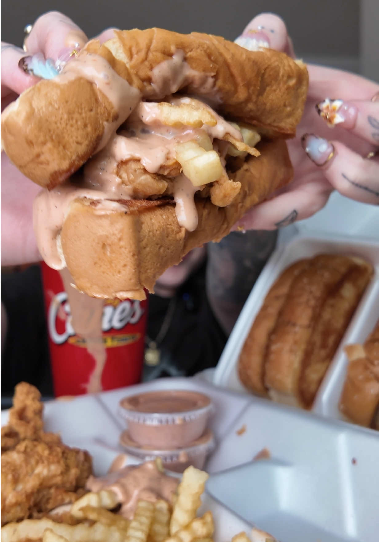 raising canes with of course the cup of sauce🐔 how much extra canes sauce do you ask for with your order??🥰 @Raising Cane's #raisingcanes #chickentenders #crunchyasmr #mukbang #fypシ 