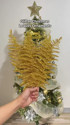 Glittered Christmas Tree Leaves ✨😍 #christmasdecor #christmasornaments #christmastreeleaves #glitterleaves #goldsilverchristmastree 