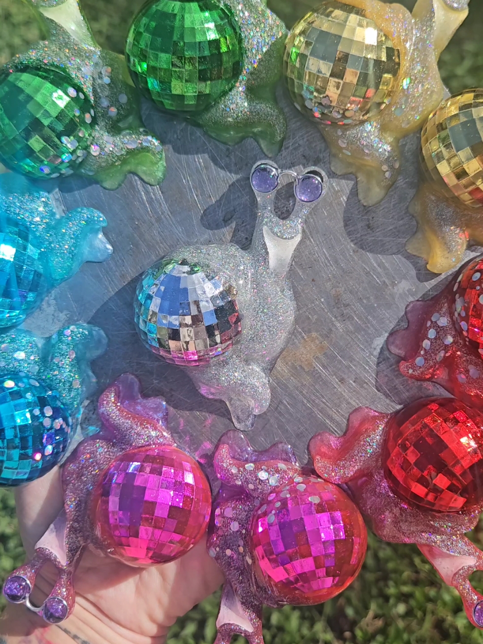 Replying to @paws.and.pagesMore Disco Snagnets for this friday!✨️🕺#snails #fridgemagnets #discosnails #disco #discoball 