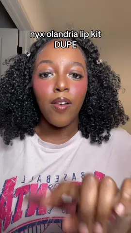 I still will be purchasing the kit when it’s available again but right now the dupe will do!!  Products :  @NYX Professional Makeup - SHINE LOUD HIGH SHINE LIP COLOR (Magic Maker)  @COVERGIRL  Perfect Blend Pencil, Black Brown 110 #oladrialipcombo #olandrialoveisland #nyxlipliner #lipcombo #makeupdupe 