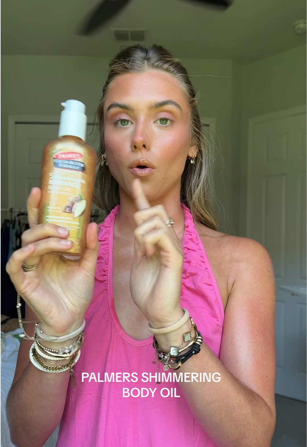 everytime i share anything from this brand there’s a cult following attached that wants their fav products to be gatekeepers 🤗 this is shimmering body oil and did I mention VERY affordable too!! The glow and shimmer shine is unreal 😌 I have it 🔗 in my LTK.  #palmersbodyoil #shimmeringbodyoil #bodyglow #palmersshimmeroil #bodyglowoil @Palmer's 