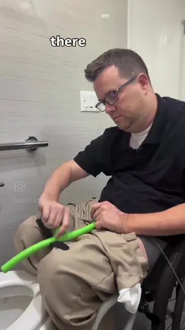When using straight intermittent catheters (without a collection bag) to perform daily self-catheterization it can be difficult to empty your bladder directly into a toilet. Many of us will use a urinal to collect the urine and empty it into a toilet because the catheter isn’t long enough to reach the toilet bowl. Some of us will purchase longer catheters or get catheter extensions that are difficult to attach to the existing catheter with limited hand function. We developed the Uri-Luge to provide a path for the urine to flow from the end of the intermittent catheter into the toilet bowl. This is a two piece tool that snaps together providing over fourteen inches of extension for the catheter to reach the toilet.  At the mouth of the Uri-Luge is the urinal cap design which locks the end of the catheter in place. There is also a hook/handle near the top that goes inside the opening of the shorts or pants to anchor the Uri-Luge. At the middle of the tool is a loop to maneuver the Uri-Luge along with three indentations for grip. We also made a lap rest that snaps onto the tool so that the Uri-Luge does not come in to contact with the toilet bowl.  The Uri-Luge is available now in our online shop!  Please check out our adaptive product line by clicking on the view shop button or visiting us at www.abiliteaseadaptive.com and support a disabled owned business.  You can also access the link above in our bio. [Video Description: In this video Mark demonstrates how he uses the Uri-Luge as a catheter extension to help the urine emptying from his intermittent catheter reach a toilet or other areas.] #uri-luge #selfcatheterization #intermittentcatheterization #cleanintermittentcatheterization #cic                       