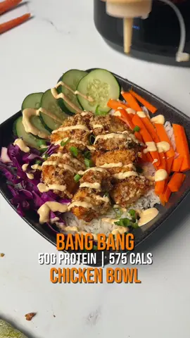 BANG BANG CHICKEN BOWL verse of the day 🙏🏽 1 John 2:15 Do not love the world or anything in the world. If anyone loves the world, love for the Father is not in them. For the chicken: * 32oz chicken breast * 1 cup panko breadcrumbs * 1/2 cup plain greek yogurt For the sauce: * 1 cup plain greek yogurt * 2 tbsp light mayo * 1 tbsp sriracha * 2 tbsp sweet chili sauce * 1/2 tsp rice vinegar Rest of bowl: * 2 cups jasmine rice * 1 cup carrots, shredded * 1 cups purple cabbage, shredded * 1 cucumber * 4 tbsp green onions  Instructions 1. Cook rice per box instructions 2. Dice raw chicken into bite sized cubes. 3. Into a bowl add half a cup of plain greek yogurt with, garlic powder, onion powder, smoke paprika, salt, and pepper. Stir around then add your chicken in and coat well. (optionally marinate for 30 minutes) 4. Spread panko crumbs on a plate and dredge each chicken piece until fully coated. Evenly space out in an air fryer and spray with oil. Depending on size of air fryer you might need to do 2 batches, keeping the chicken too cramped together will make it soggy rather than crispy. 5. Air fry at 400 for 7 minutes, flip then 7 more minutes or until golden brown and crispy or if your air fryer isn’t big enough do the oven at 425 for 11 minutes, flip and 11 more. broil until crispy 6. For the sauce add 1 cup plain non-fat greek yogurt, 2 tbsp light mayo, 1 tbsp sriracha, 2 tbsp sweet chili sauce, 1/2 tsp rice vinegar, garlic powder, and a pinch of salt (full sauce video is posted) (if the sauce is too thick use some water to dilute it) 7. Assemble your bowls by adding in the chicken and rice, then when you're going to eat the bowl microwave it for 60-90 seconds then add your veggies and sauce! Recipe makes 5 servings, macros per serving:  576 calories, 50g protein, 78g carbs, 7g fat