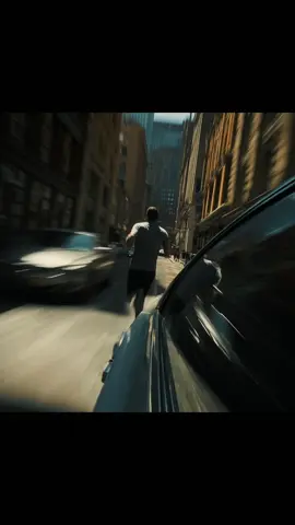 Consistency Prompt: A cinematic animation of a man sprinting at high speed through a city, running toward the street. He races forward with powerful strides. The camera follows he closely from behind, tracking he rapid motion. cars and other citizens blur strongly in the foreground and sides, enhancing the sense of speed and urgency, while the bright daylight and wide landscape create a dramatic, exhilarating atmosphere. After 6 sec character will jump and become spiderman. #motivation  #midjourney 