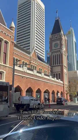 Perth Town Hall stands tall, fenced for heritage repair—time keeps moving, history holds. #perthlife #perthcity #cityexplorer #fyp #perthlifeattitude 