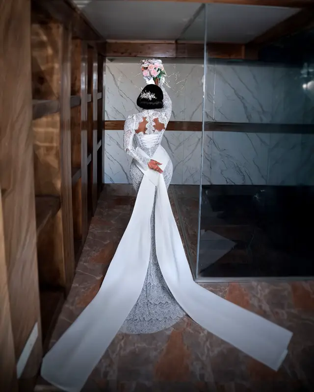 When God wants to Bless a man, he gives him a QUALITY WOMAN✨🤍💍   𝐓𝐇𝐄 𝐖𝐇𝐈𝐓𝐄 𝐂𝐇𝐀𝐏𝐓𝐄𝐑 𝟐𝟎𝟐𝟓   ______________________  MY DRESS & VEIL: @delightful_wedding_designs @victoria_stylish  MAKEUP: @nawti_beautybar  HAIR STYLIST: @nawti_luxehair  BOUQUETS: @flowersfromtianna  ACCESSORIES: @beauty_wedding_accessories__  PHOTOGRAPHER: @kenlaw_photography  LOCATION: @stayover_mikocheni