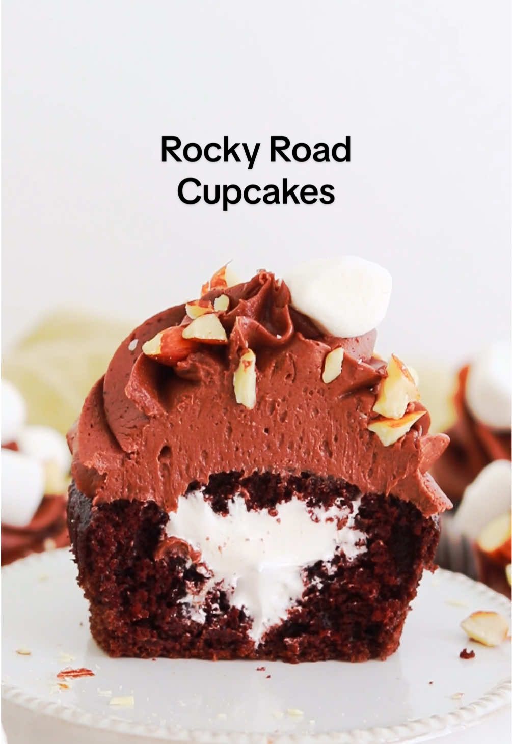 Rocky road cupcakes 🤩  I’m partnering with #chsugar to bring you this delicious, easy cupcake recipe inspired by the classic rocky road ice cream! It’s my favorite chocolate cupcake recipe made even MORE moist and fluffy with C&H® Baker’s Sugar™, then filled with homemade marshmallow creme filling, topped with fudgy chocolate buttercream, mini marshmallows, and chopped almonds 🙌🏼 The ultrafine grain size of C&H® Baker’s Sugar™ makes a huge difference in cake texture – it dissolves easily and is amazing at aerating cake batter, so these cupcakes turned out even more moist and fluffy than ever.  And bonus – it’s now available in an Easy Baking Tub for convenient measuring and storage!  Get the recipe at the link in my bio    #ad #chsugarpartner #rockyroad #cupcakes 